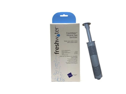 The FreshWater Ag+ Silver Ion Sanitizer is a gray, cylinder shape and is leaning next to a blue and white box.  The gray cylinder comprises two pieces-a larger, gray cylinder with filtration holes and a smaller cylinder with disk top that inserts into the larger cylinder.  The main colors on the box are blue and white.  The white section has a light, blue drop.  Below in the white section it says “Freshwater” in blue, capital letters.  A blue box lists the composition of ingredients in a white font.