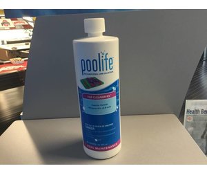 Poolife Tile Cleaner is packaged in a white quart bottle with a screw on lid. The label depicts water and states "Superior formula. Removes dirt, oil & scale." Warning label at bottom iterates possible skin irritation and burns if swallowed or inhaled. Read precautions and instructions on rear label. 